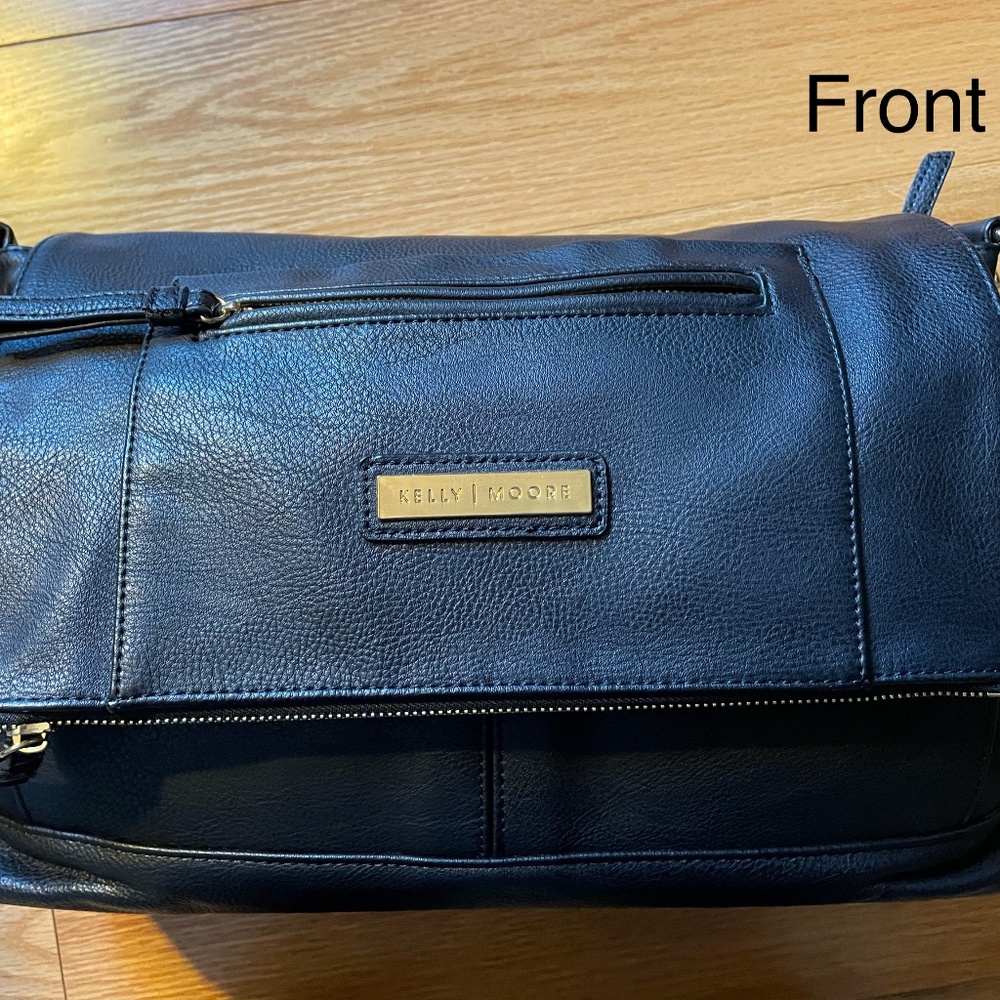 Kelly Moore black leather shoulder purse/travel bag/camera bag/diaper bag.